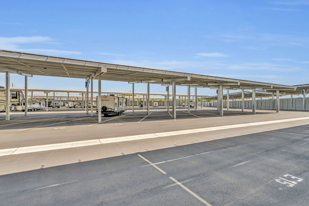 Solar-powered covered parking at LuxeGuard RV and Boat Storage in Pittsburg, CA for RVs and boats.