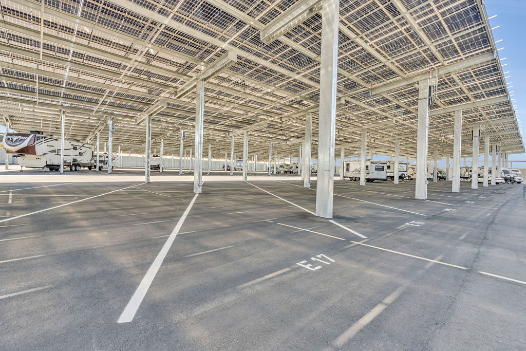 Solar-powered covered parking at LuxeGuard RV and Boat Storage in Pittsburg, CA for RVs and boats.