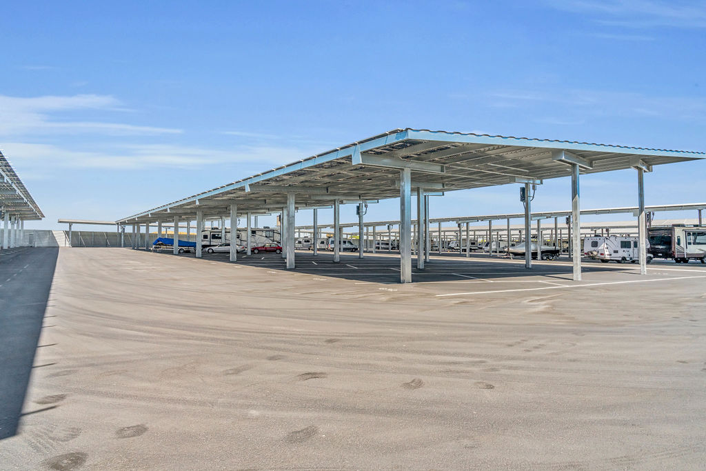 Solar-powered covered parking at LuxeGuard RV and Boat Storage in Pittsburg, CA for RVs and boats.
