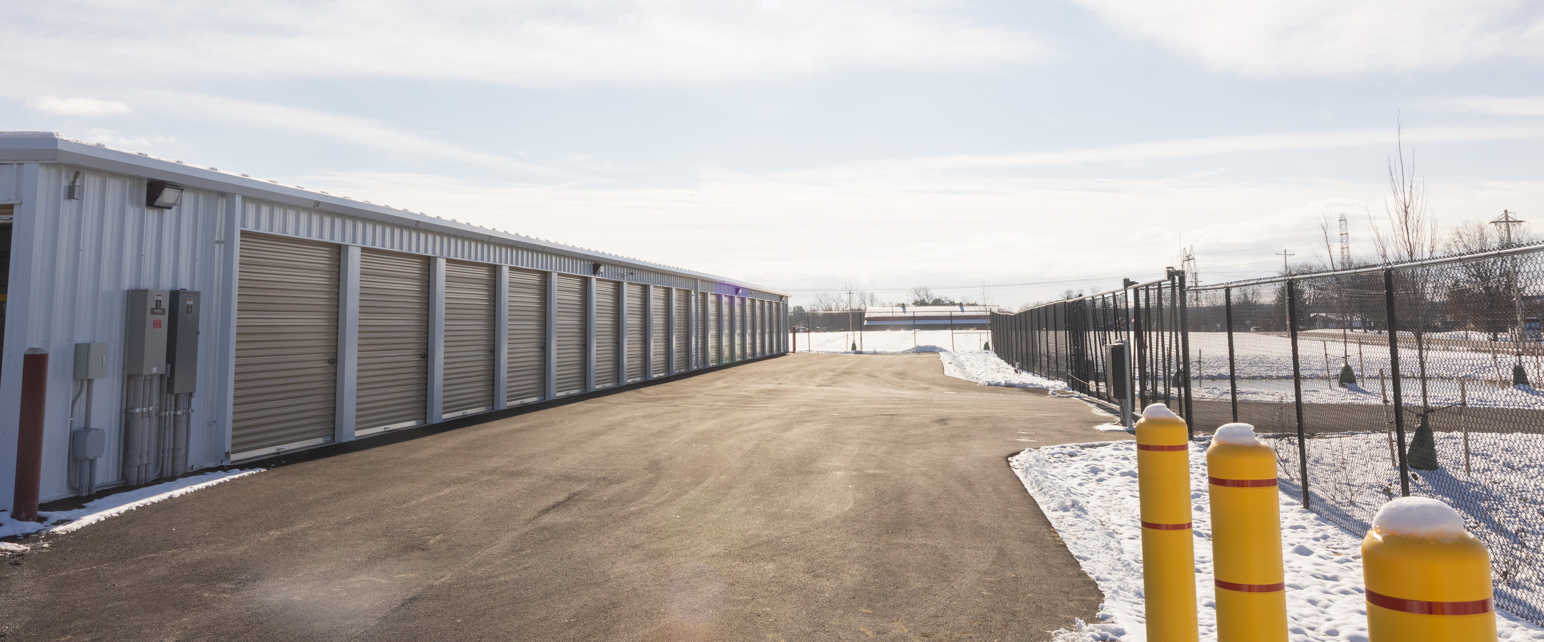 unlimited storage in sunbury, OH Exterior of Unlimited Storage facility with gated entrance and security fencing