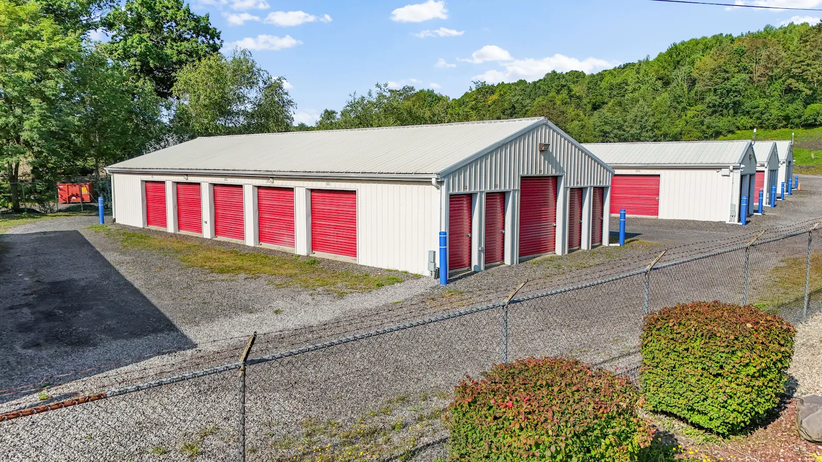 UrbanLock self-storage facility in Scranton with multiple storage buildings, secure perimeter fencing, landscaped grounds, and drive-up access units