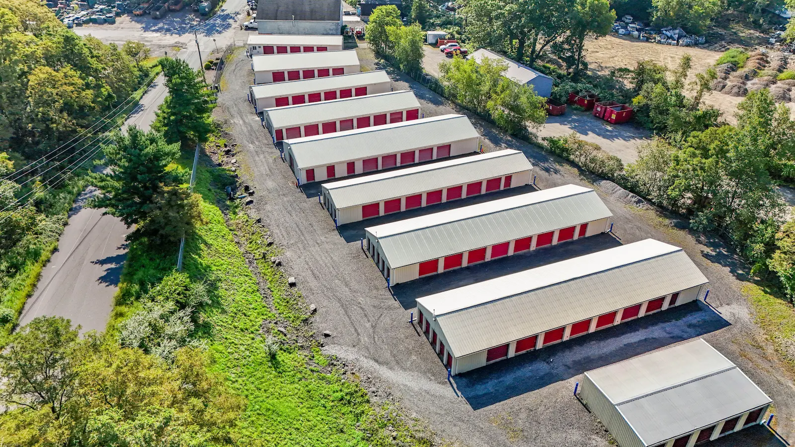 Aerial view of UrbanLock self-storage facility in Scranton showing diagonal perspective of storage buildings, tree-lined borders, and facility layout