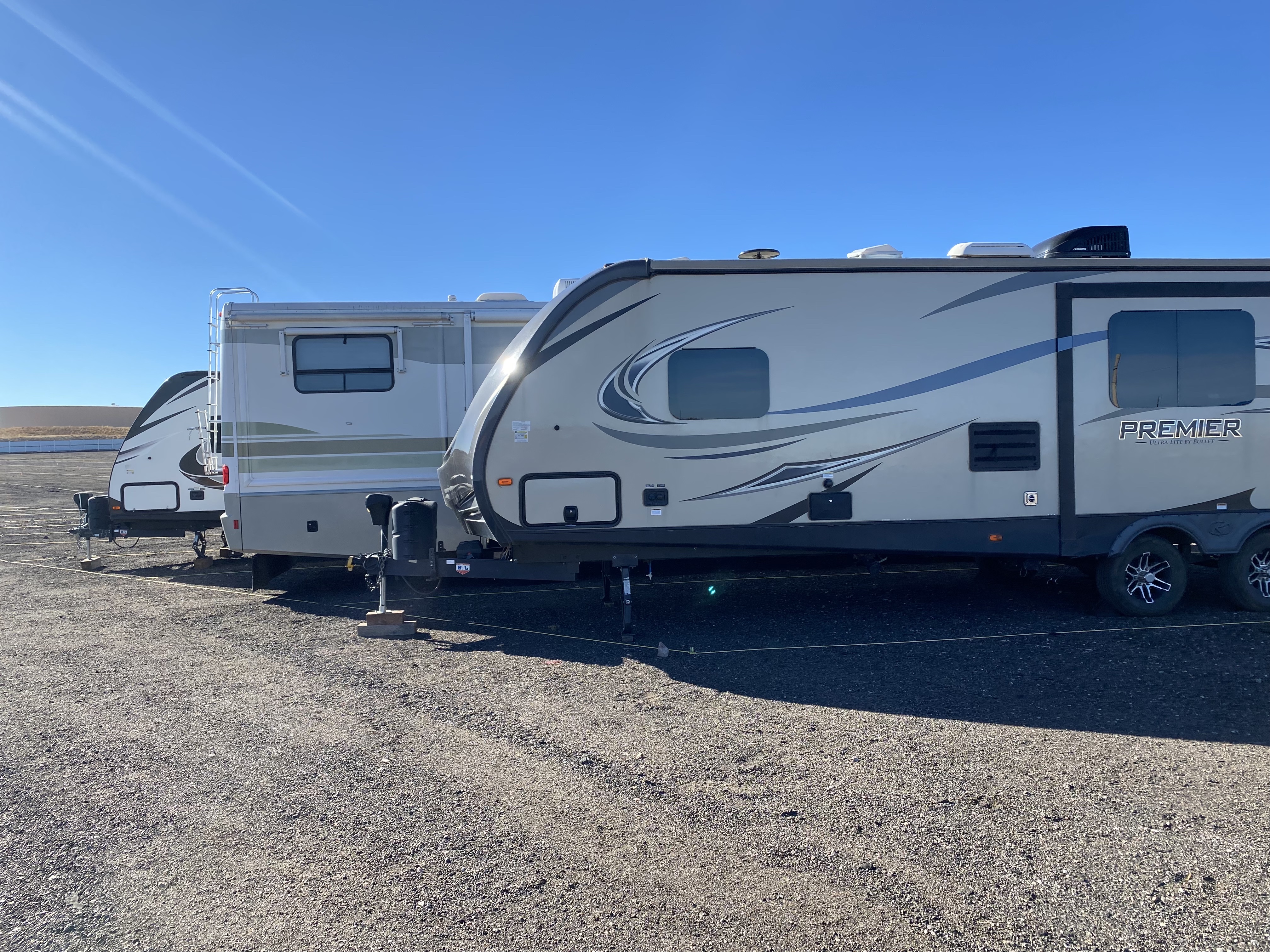 view of three rv's parked at tamlin storage