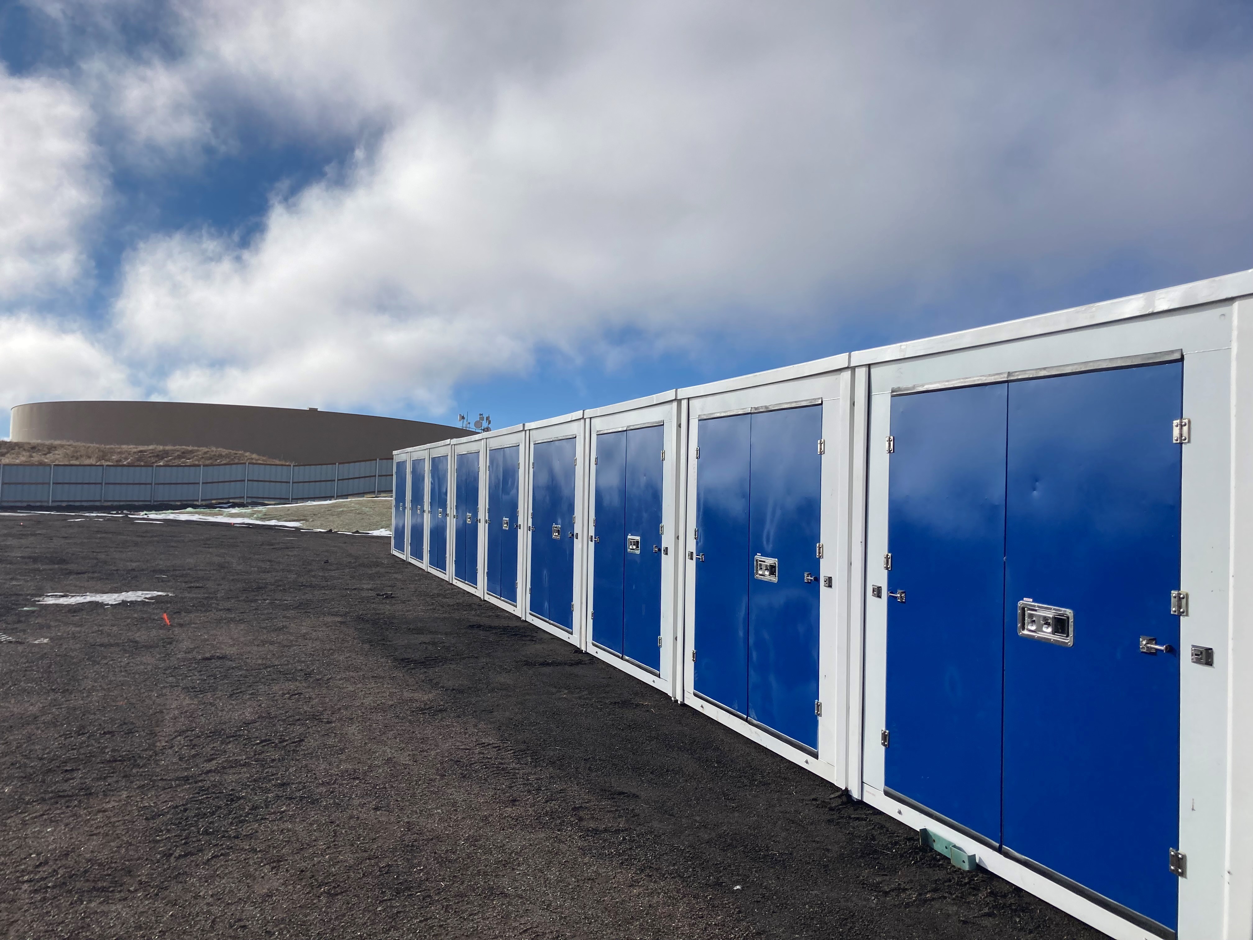 storage units with blue doors at tamlin storage