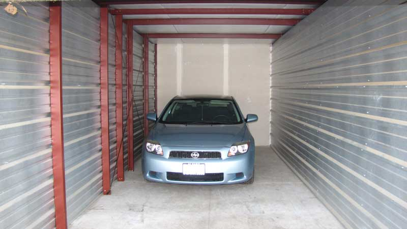 A car inside a self-storage unit.