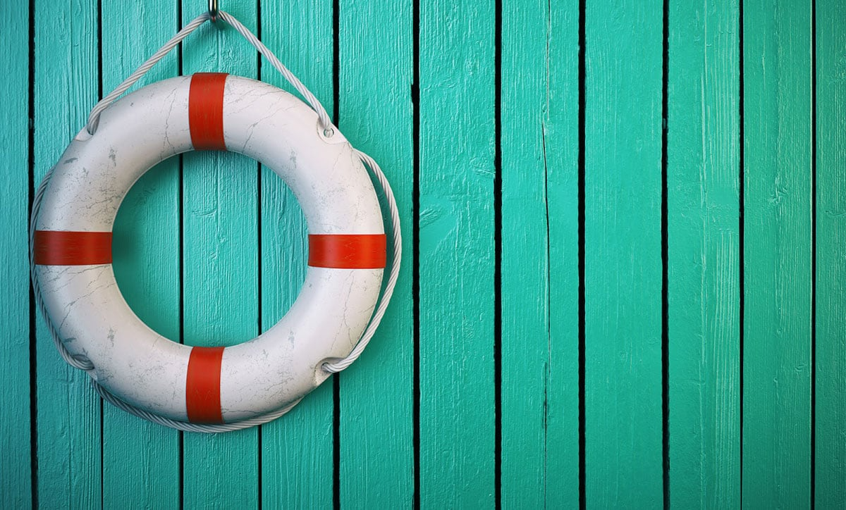 Picture of a life preserver hanging on a wall