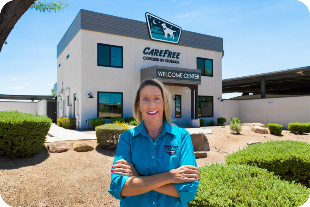 Our welcoming team is here to help at every Carefree Covered RV Storage location Friendly Carefree Covered RV Storage staff member standing outside the welcome center