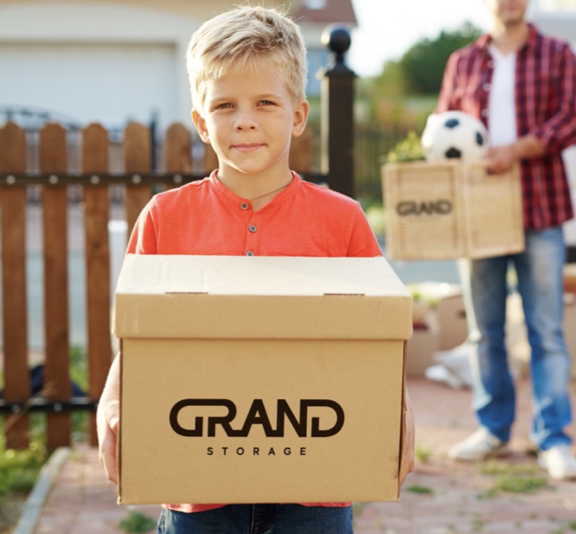 child with Grand Storage box