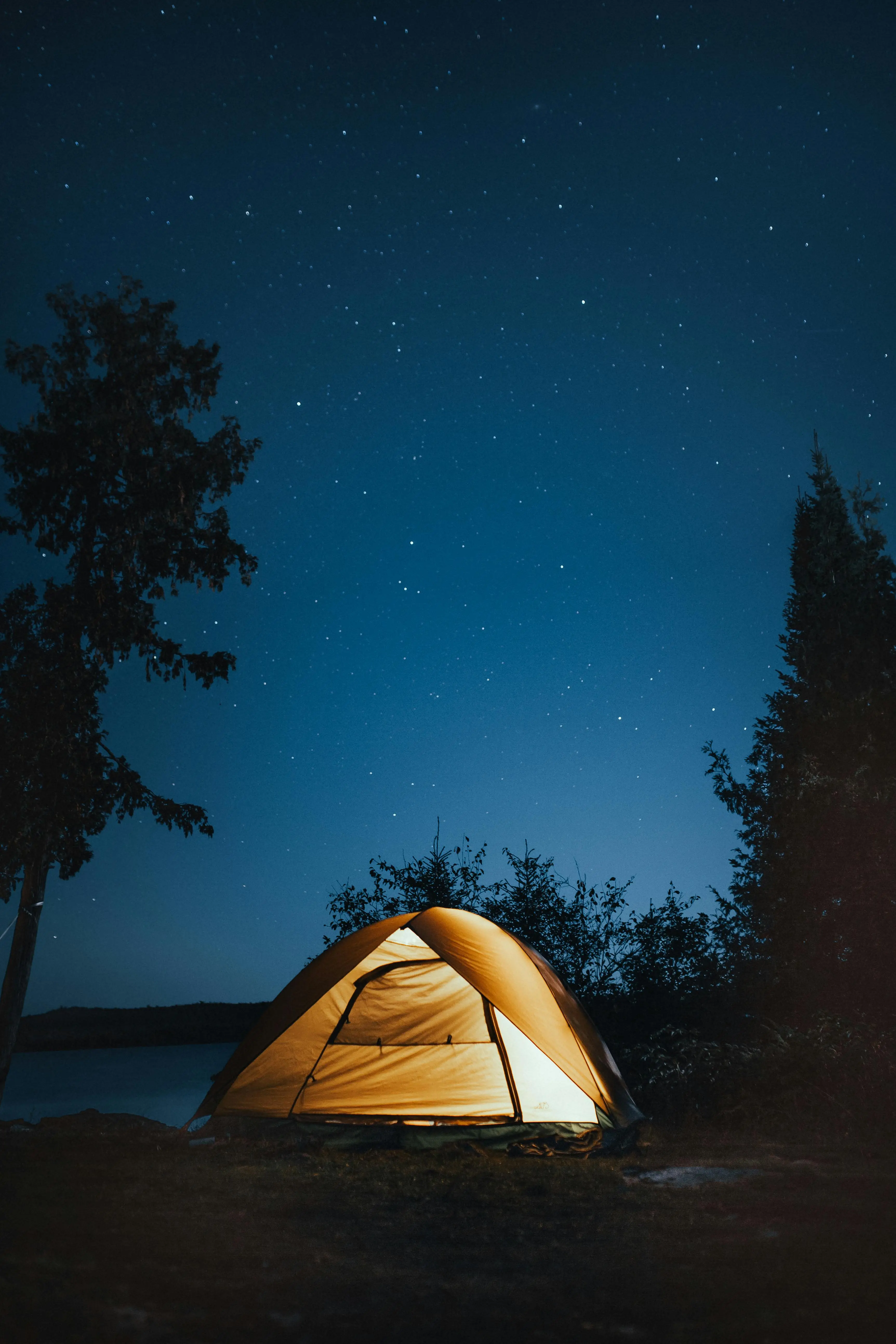 lit tent at night