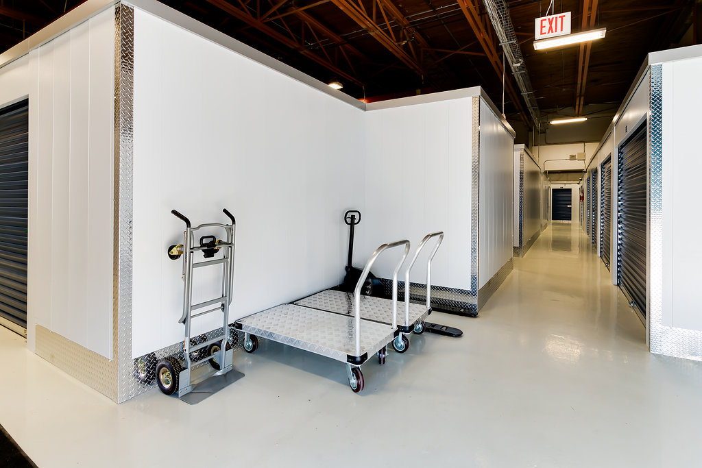 dollies and handcarts in a self storage facility with inside access units