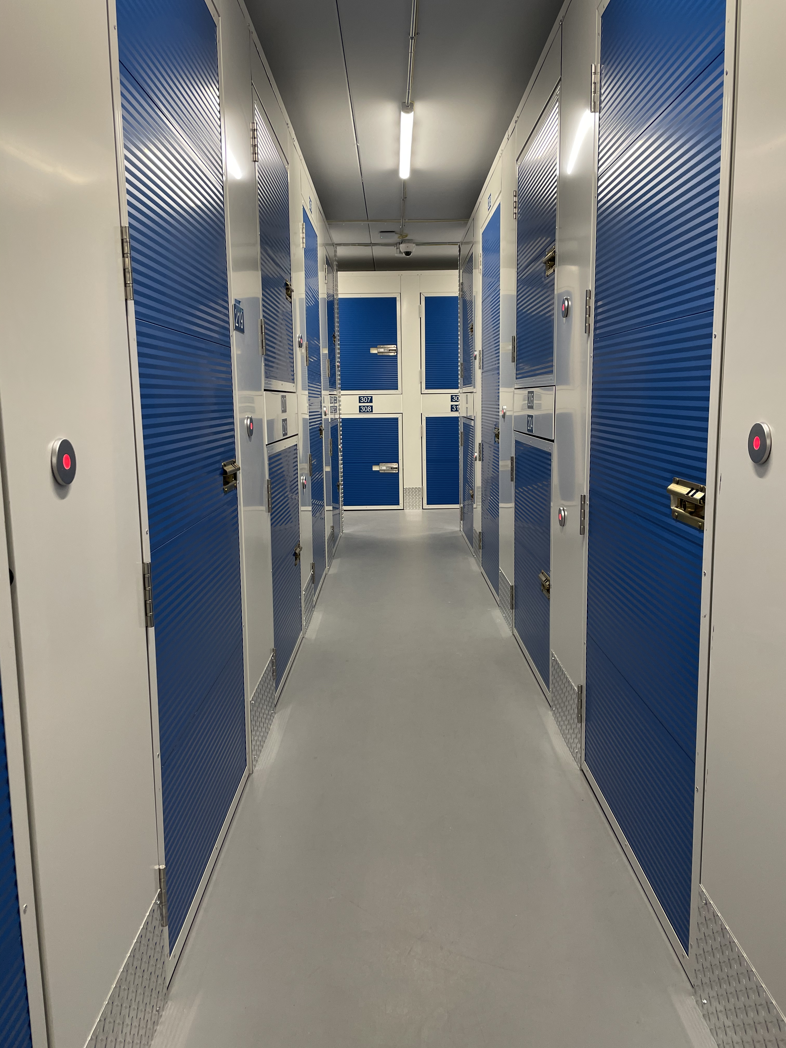 hallway with interior access self storage units and lockers