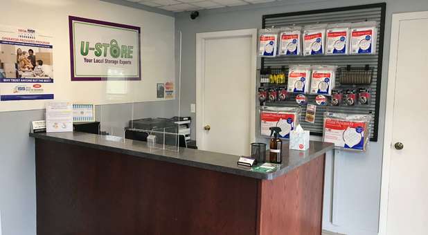 front desk and moving supplies displayed U-Store Storage - Lake Orion Front Desk