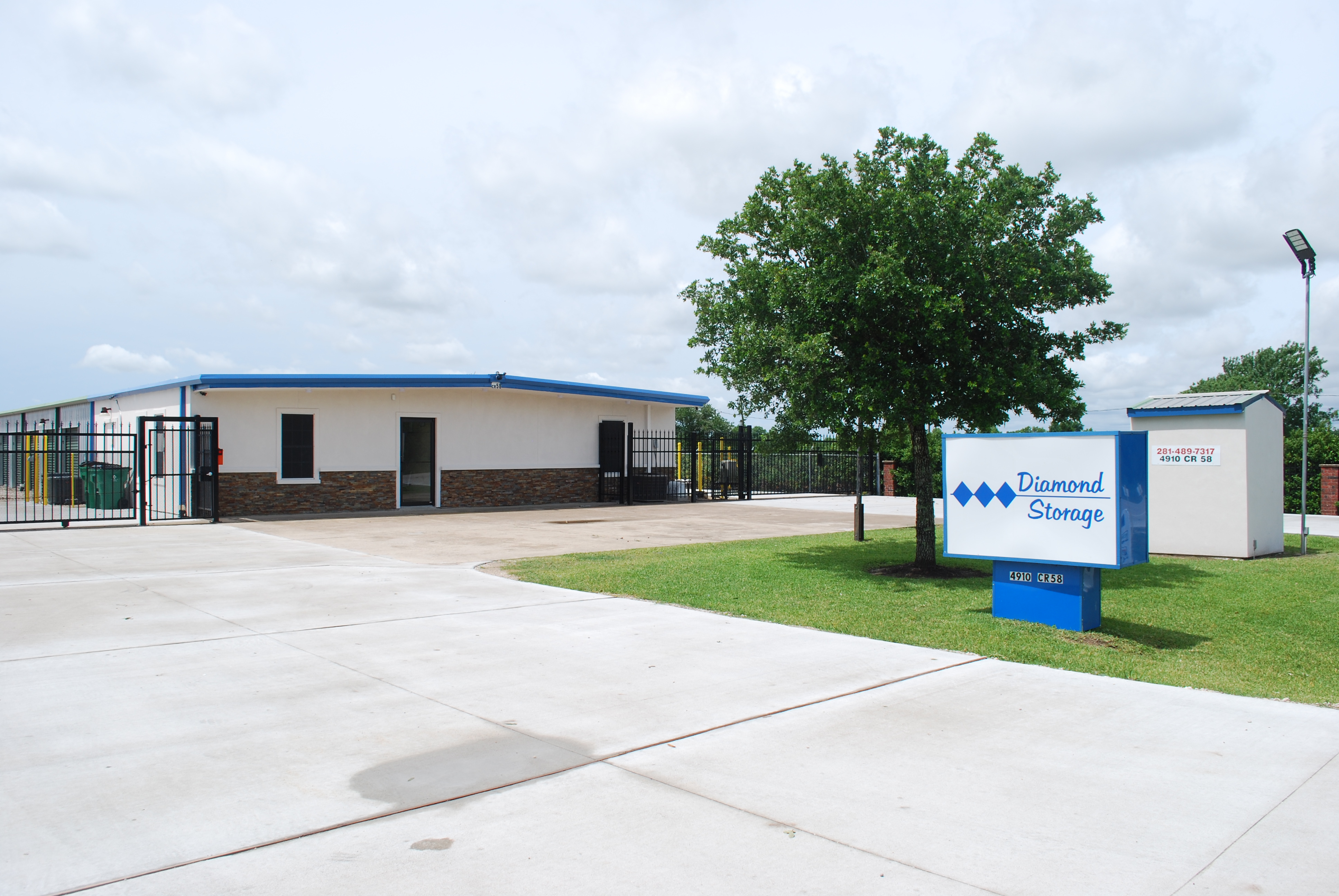 Exterior of Manvel Self Storage and sign