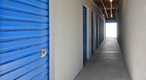 hallway of exterior access storage units