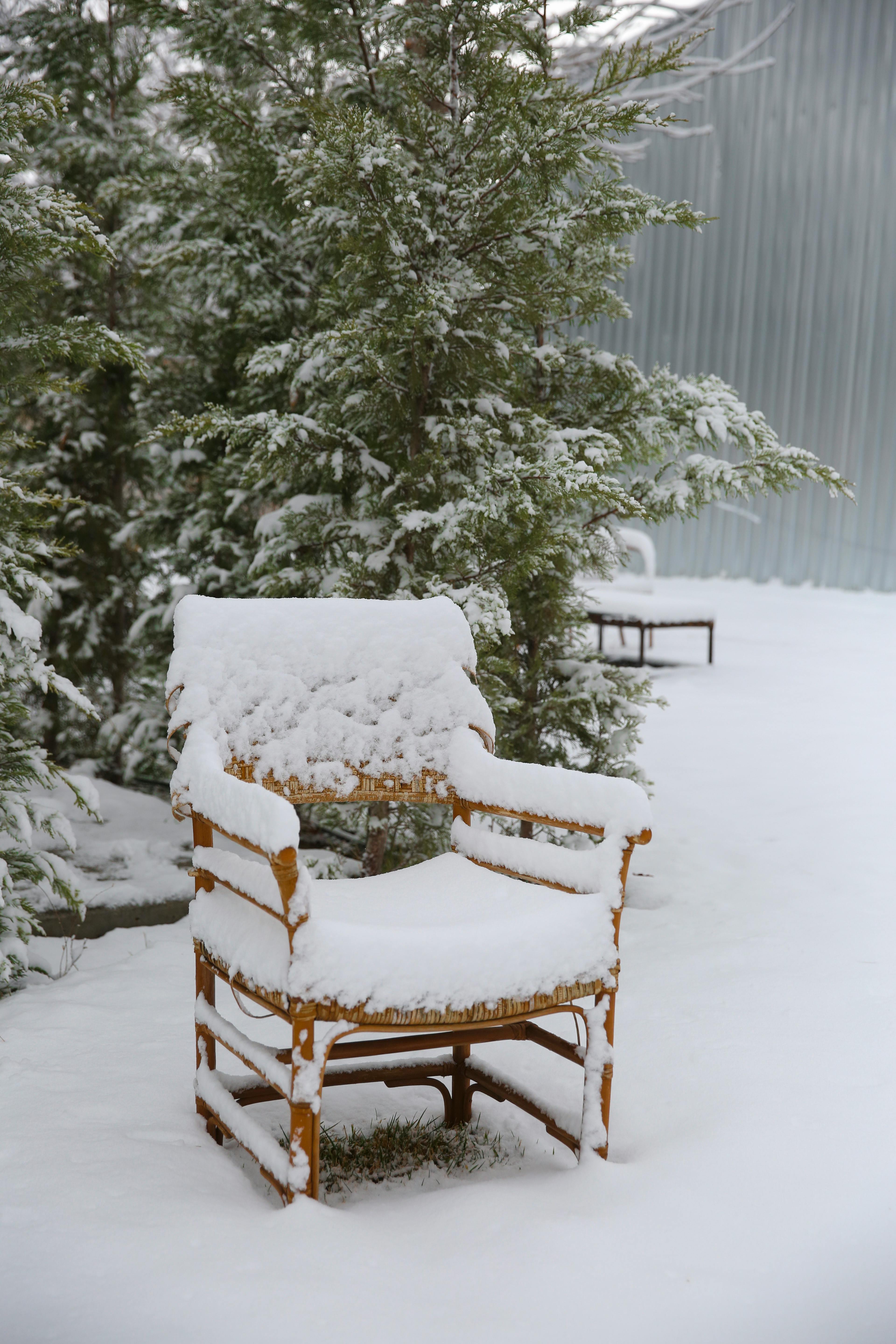 snow covered patio furniture 