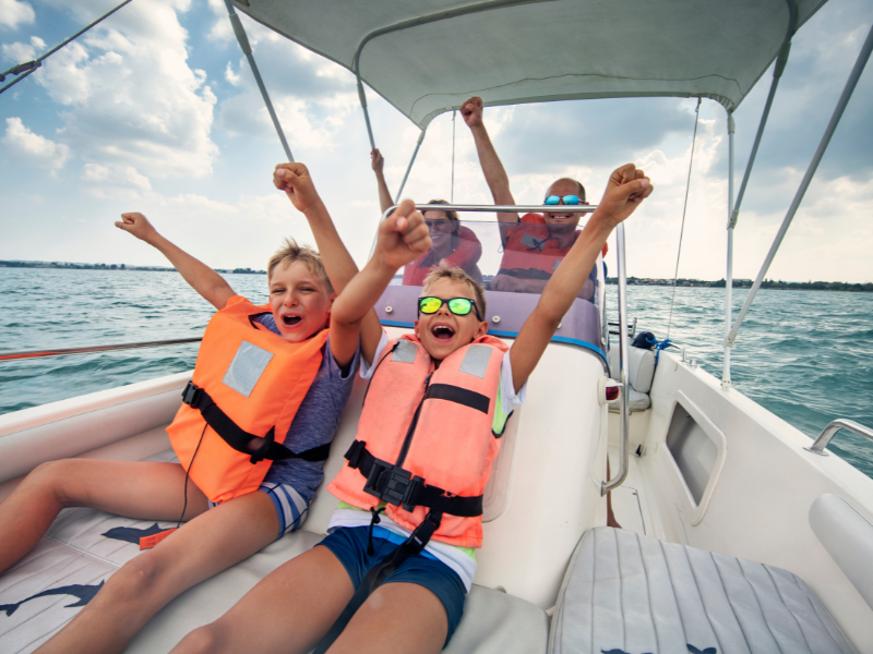 family-enjoying-on-boat