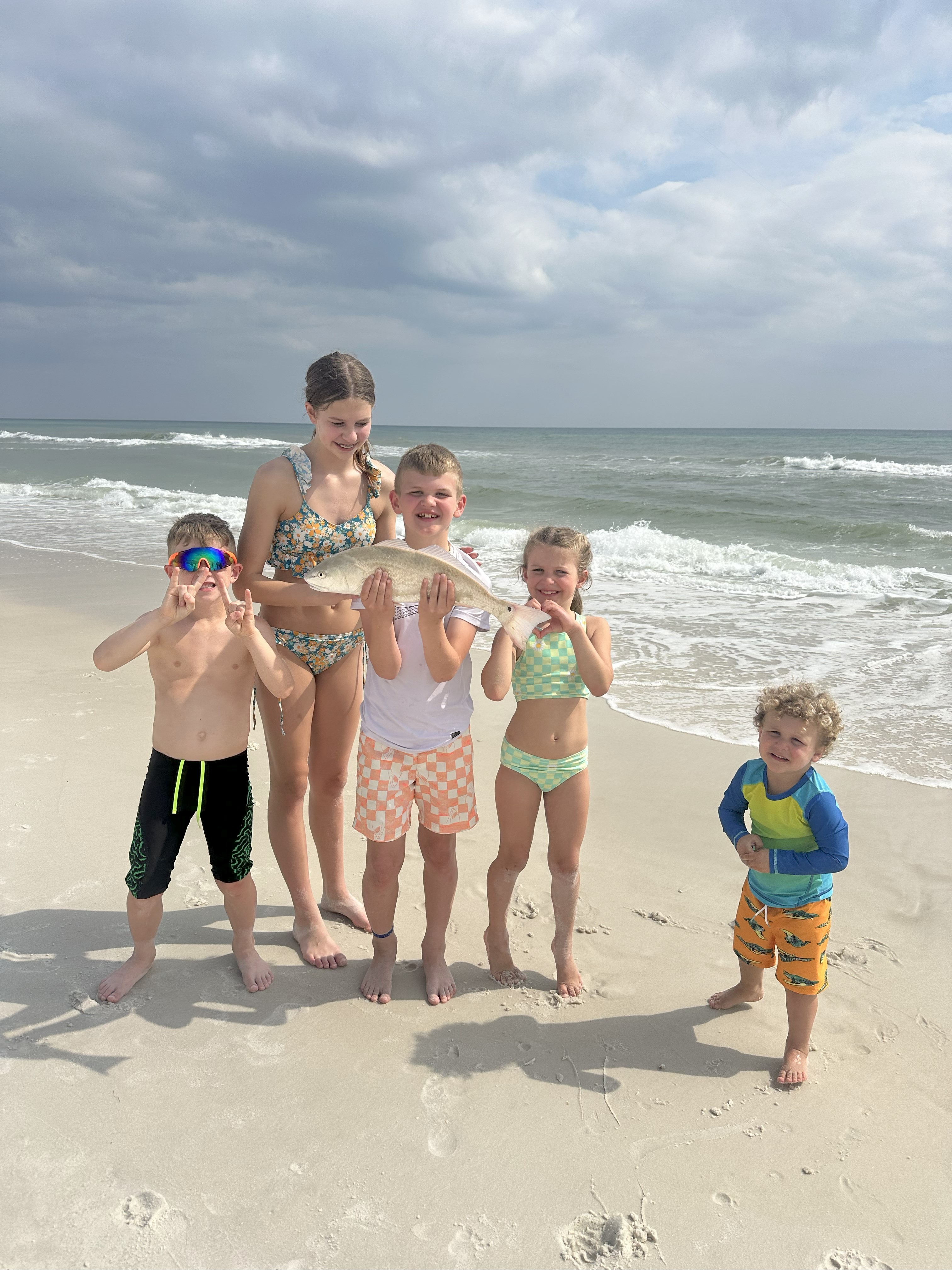 Happy Children Surf Fishing in Santa Rosa Beach, FL