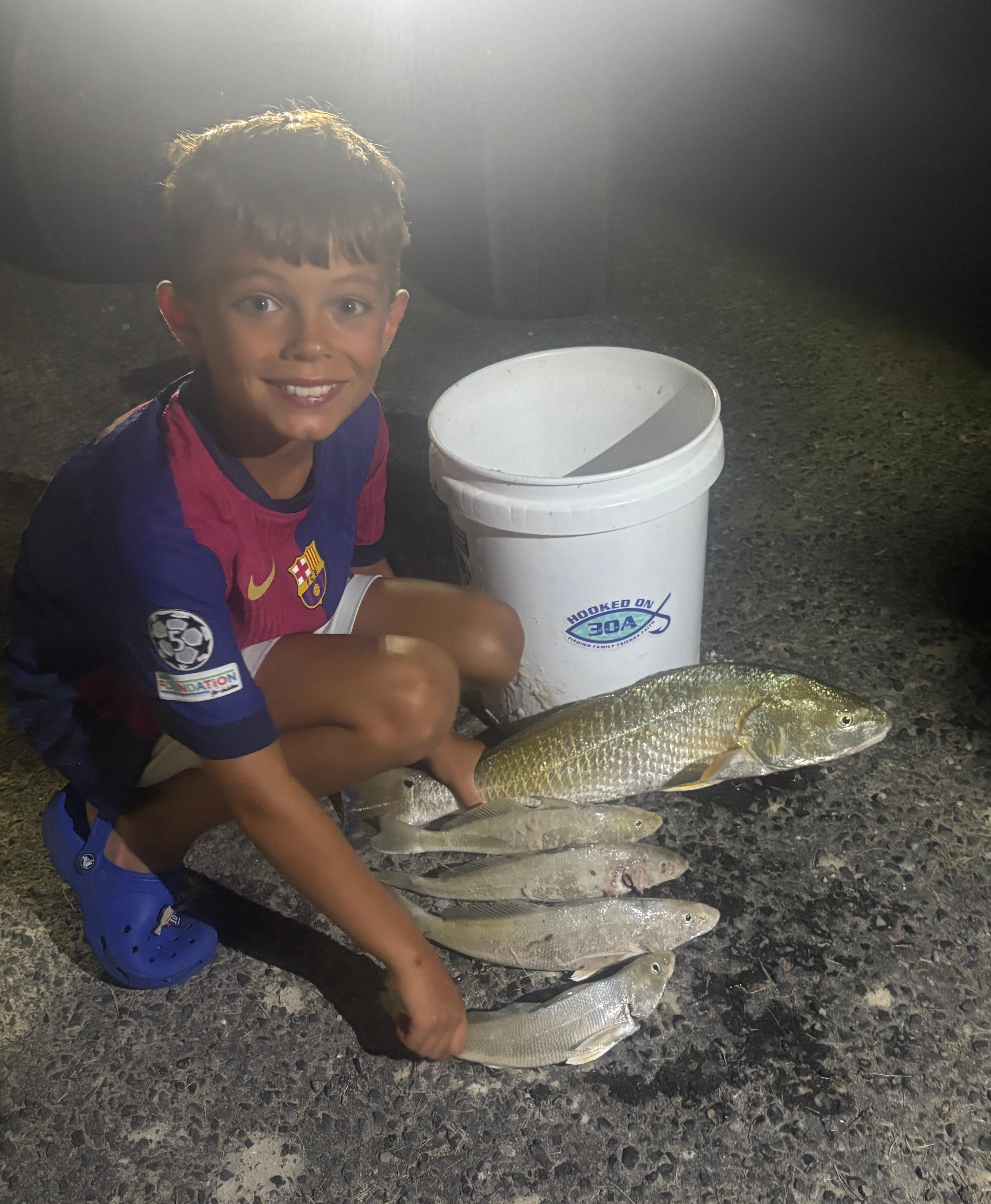 Happy Kid Night Surf Fishing in Santa Rosa Beach, FL