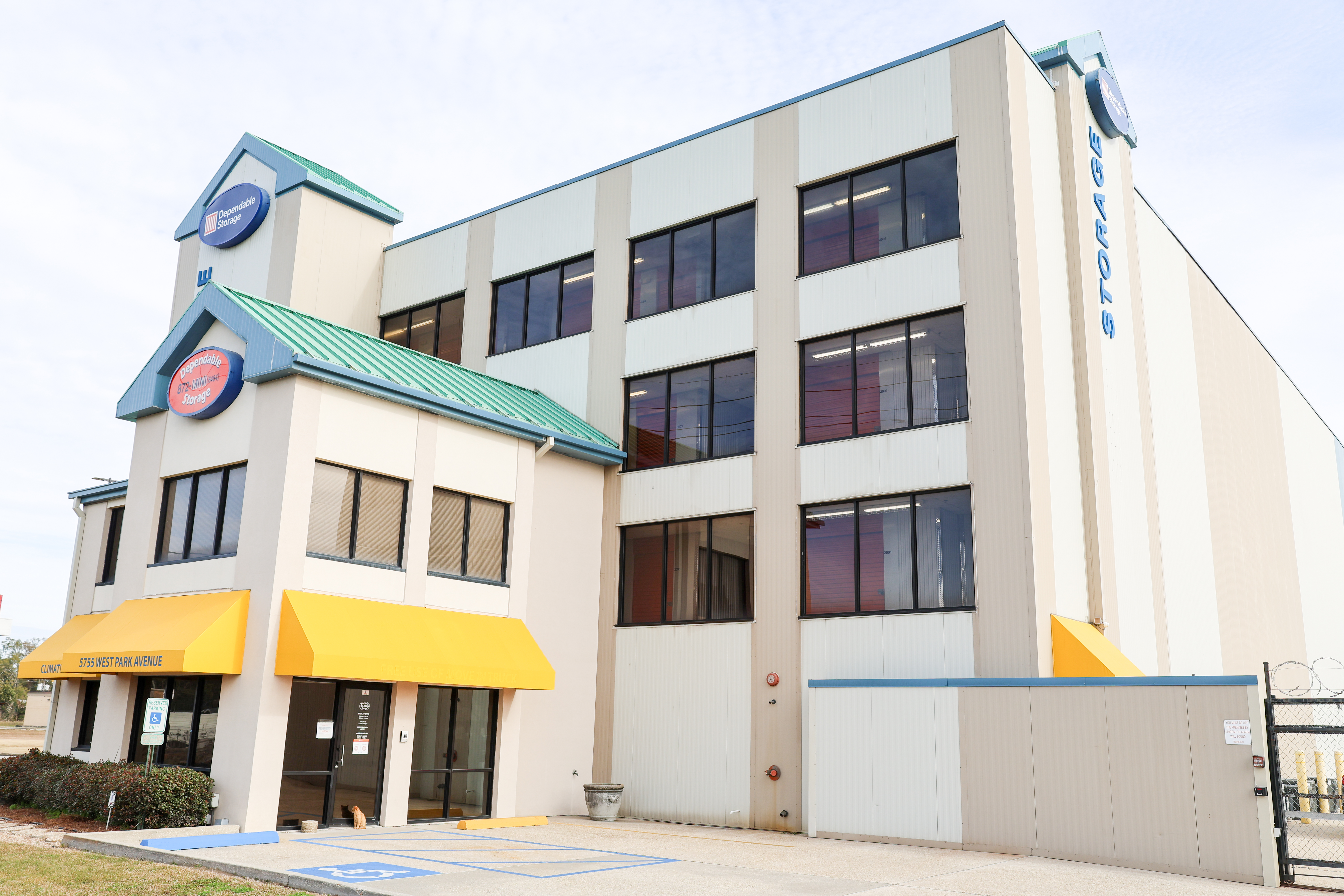 Dependable Storage climate-controlled self storage building with front entrance and covered awning