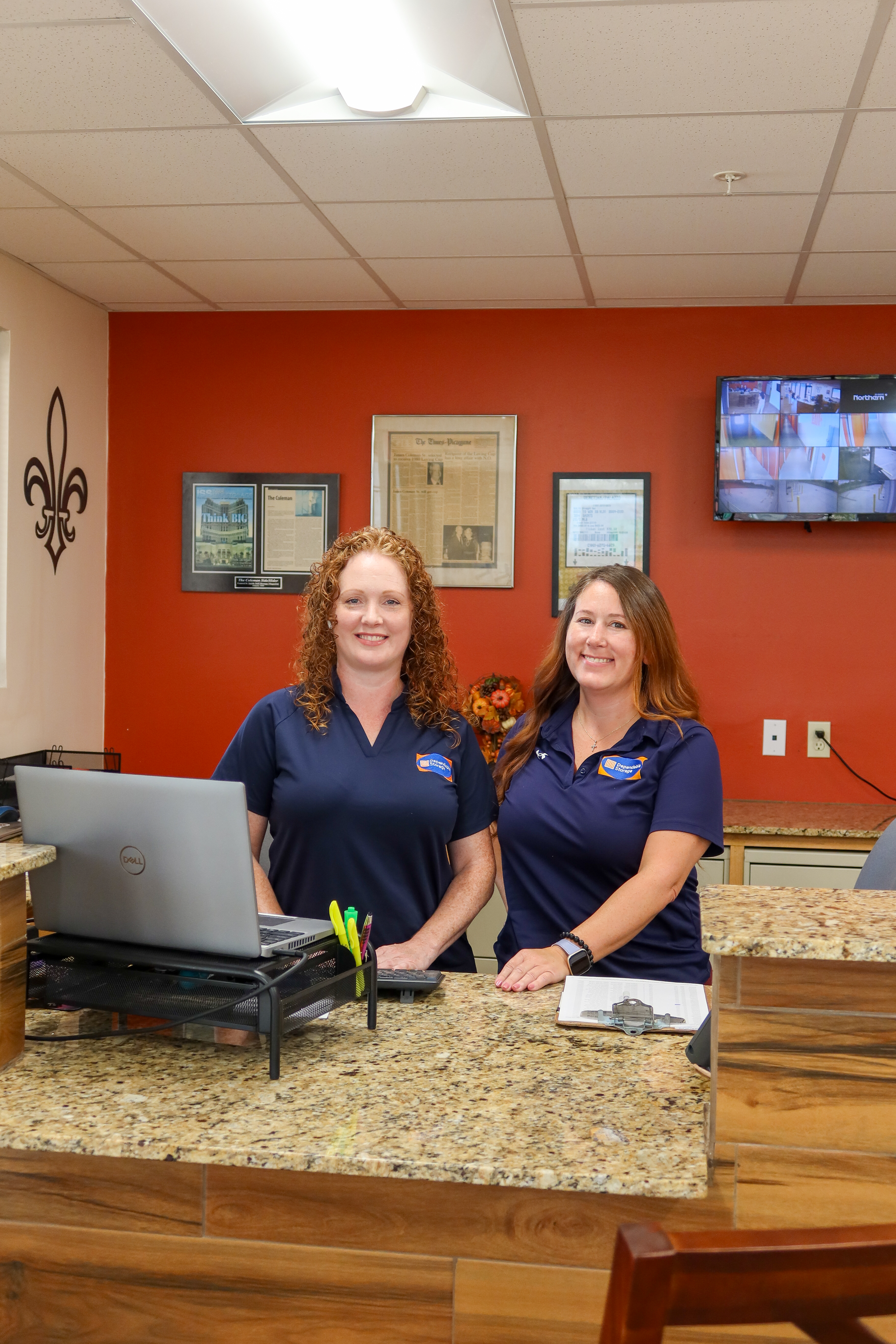 Dependable Storage Jefferson team members at front desk offering friendly customer service