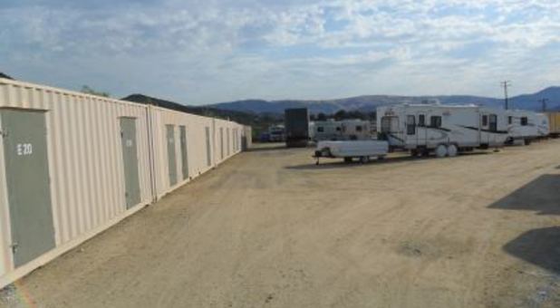 Self storage building and RVs parked in a lot
