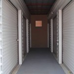 hallway with interior storage units