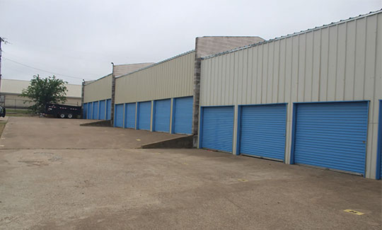 Large storage unit door to drive up units